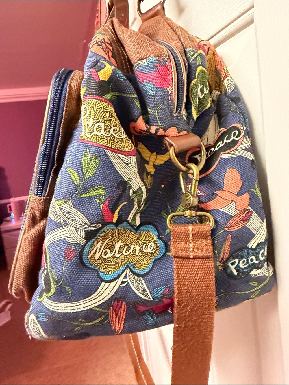Sakroots Floral Peace Canvas Duffel Bag in Navy with Brown Trim - Picture 5 of 10